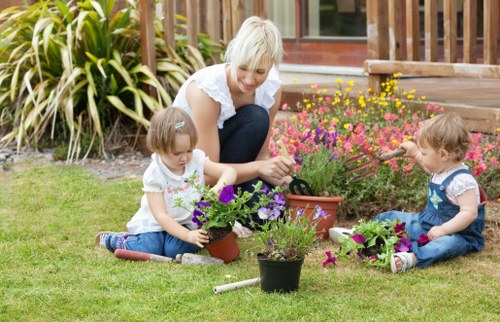 Gardeners preparing a detailed written quote
